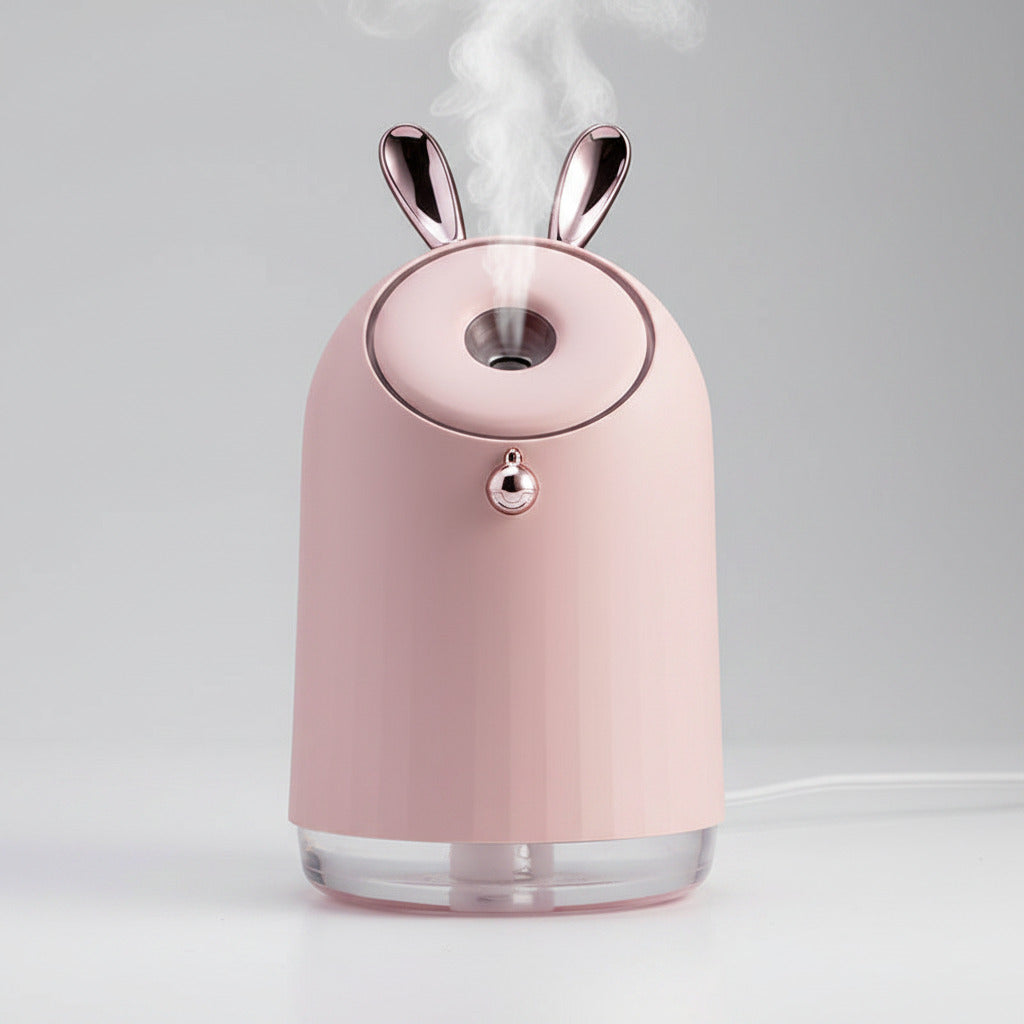 Pink humidifier with bunny ears on a white background