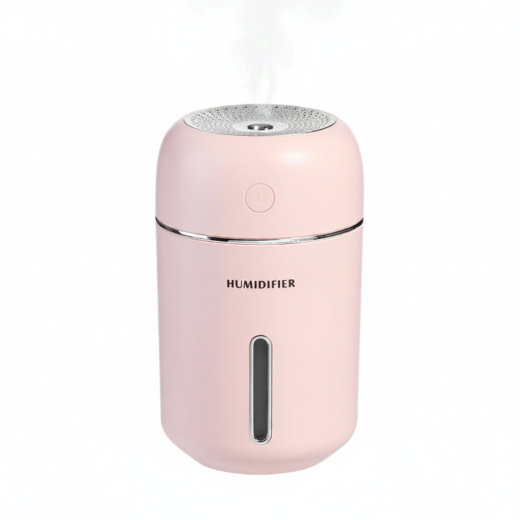 Pink humidifier on a white background